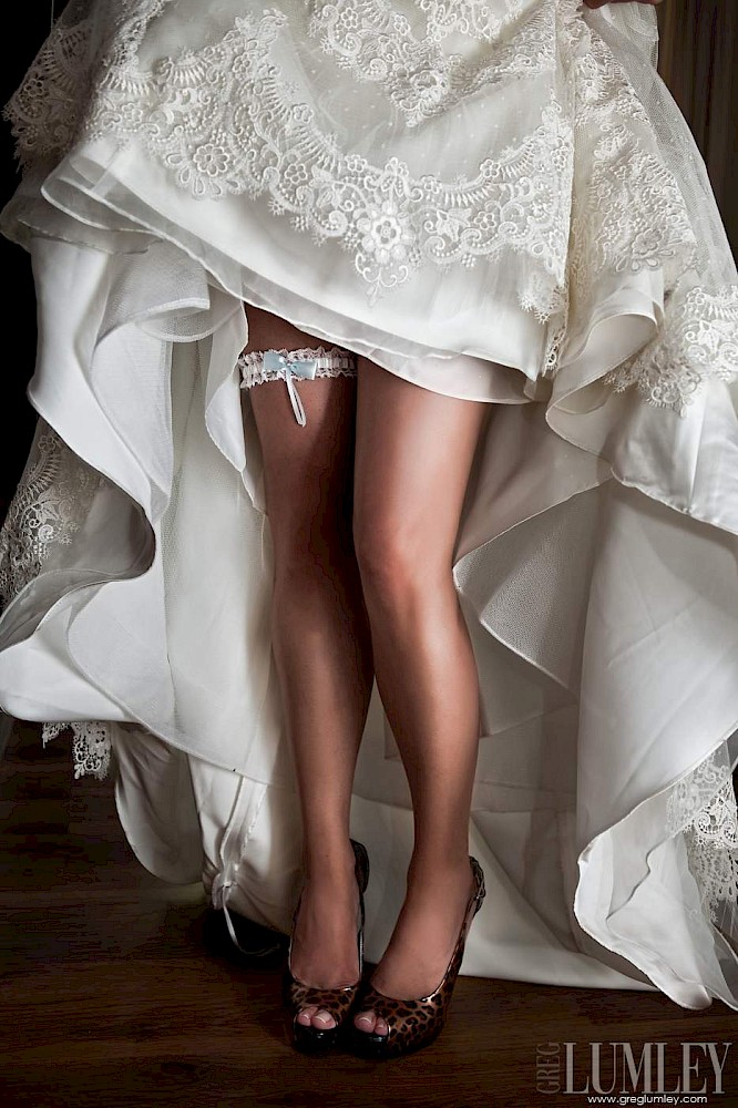 Which leg does the wedding garter go on? | Greg Lumley Photography